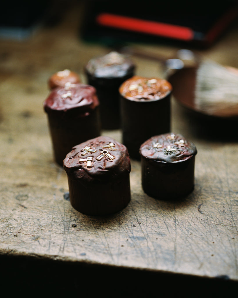 Photo of diamond earrings being made in the workshop