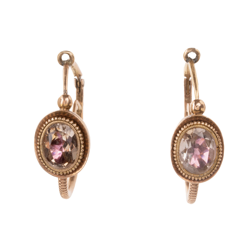 A rare example of a fine Georgian era poissarde earring. Pink topaz stones are enhanced with foil in 18k gold. The ear wires go from back to front, typical of 18th-century earrings.England. Circa 1800. Front view. 