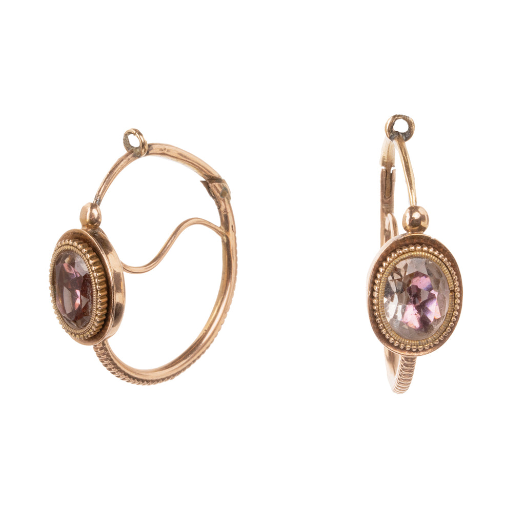 A rare example of a fine Georgian era poissarde earring. Pink topaz stones are enhanced with foil in 18k gold. The ear wires go from back to front, typical of 18th-century earrings.England. Circa 1800. Side view. 