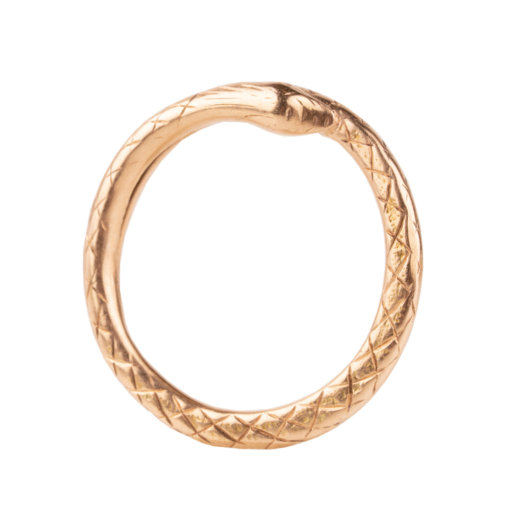 Victorian era snake split ring, in 15k gold. The ends have been soldered closed. England. Circa 1870. Profile view. 