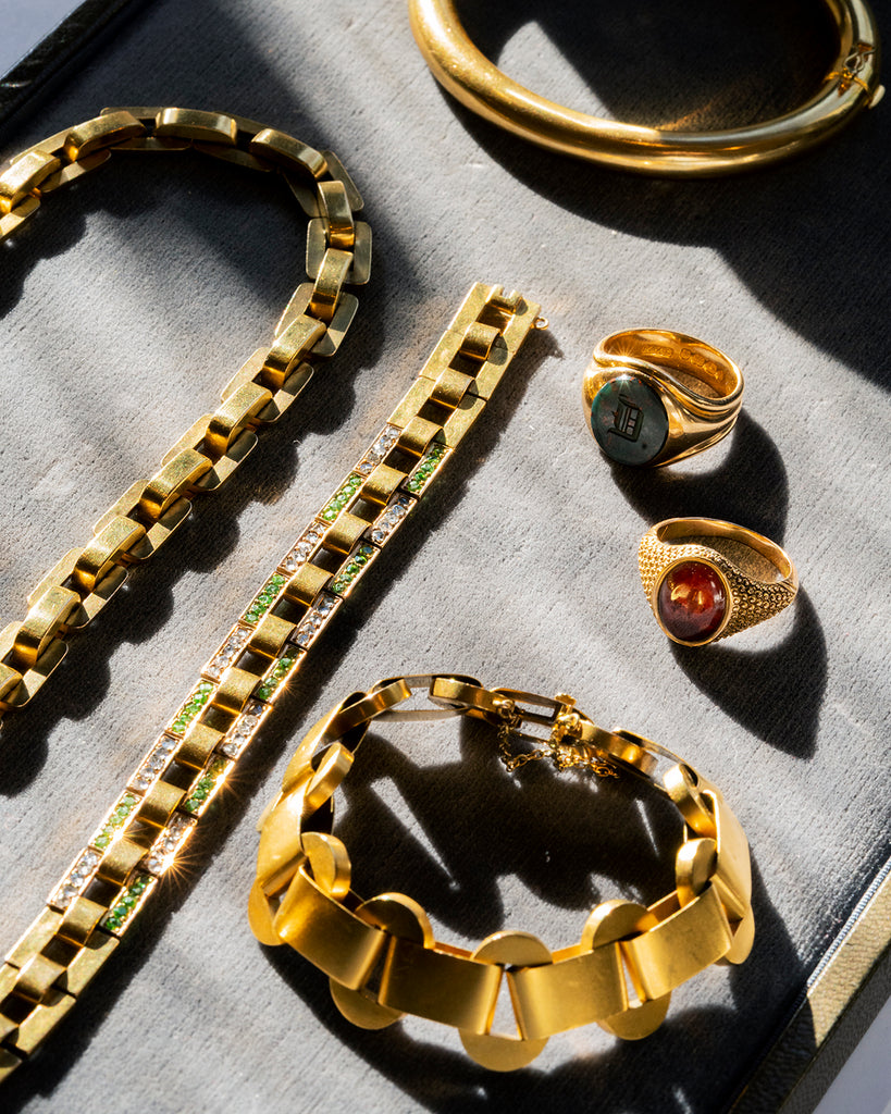 Tray of antique gold jewelry